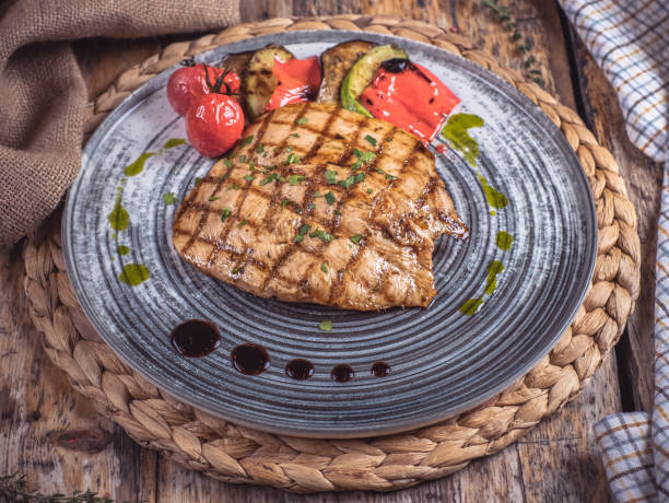 istock Grilled chicken breast and grilled vegetables 1347247612