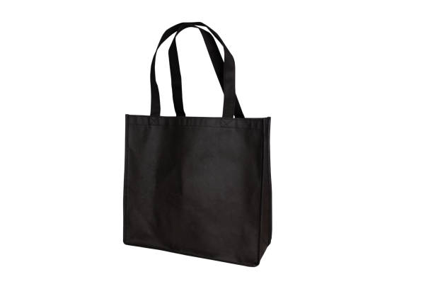 mockup black tote bag fabric for shopping, mock up canvas bag textile with reusable isolated on white background. - 環保袋 個照片及圖片檔