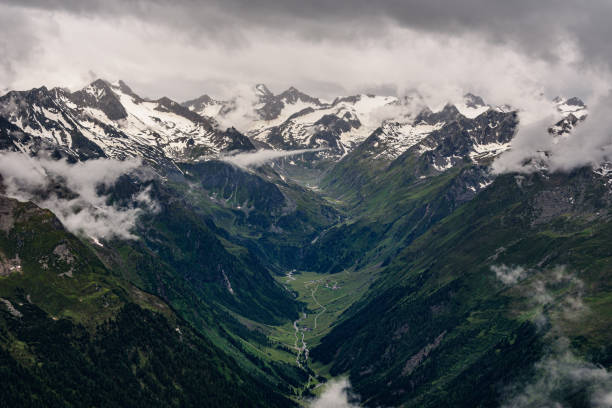 istock The Oberbergtal valley in austrian Stubai Alps in clouds. 1347253367