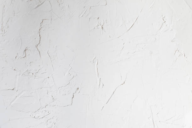 istock old background of white cement surface with cracks 1347260680