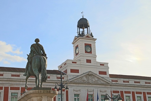 Equestrian statue of Carlos III located in the Plaza de Sol next to the Royal Post Office Palace.