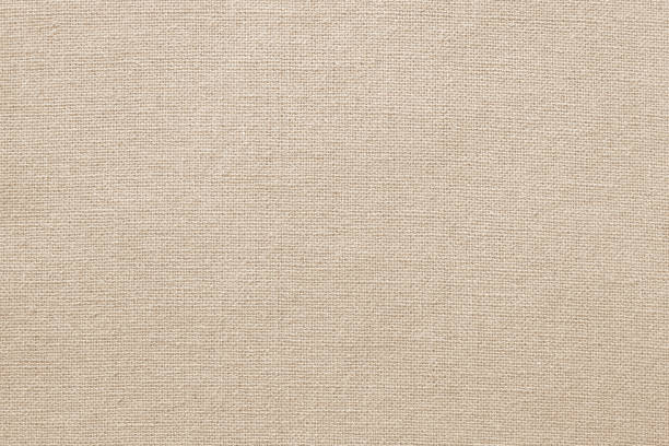 istock Brown cotton fabric texture background, seamless pattern of natural textile. 1347262470