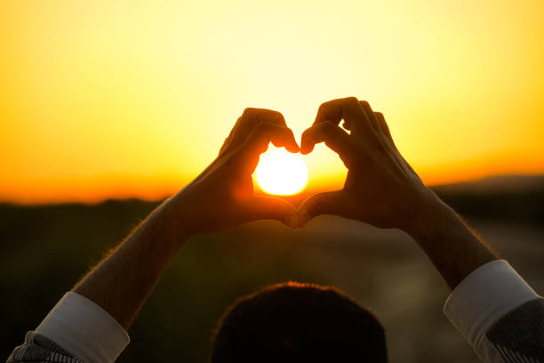 istock Heart of love with sunset 1347262557