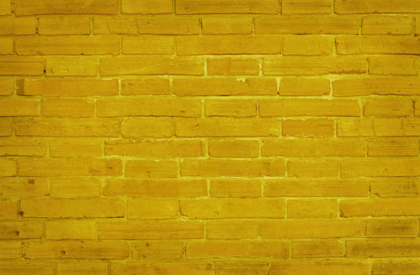 istock Yellow brick wall texture with vintage style pattern for background and design art work. 1347262606