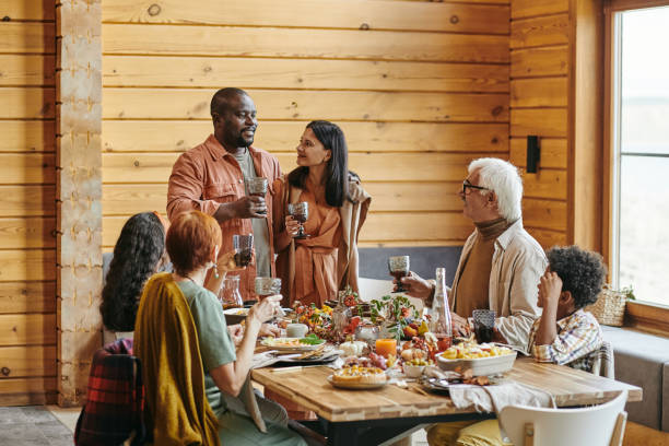 istock Young couple saying the toast at dinner 1347262714
