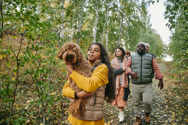 Big family walking in the forest