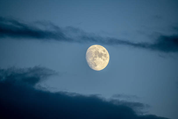 istock The moon among the clouds, beautiful moon, full moon 1347262893