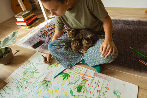 istock Making an art is always better with a company of my pets 1347263203
