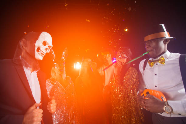 istock People dancing on Halloween party 1347264788