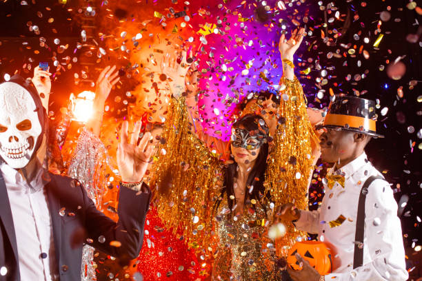 istock People dancing on Halloween party 1347264789