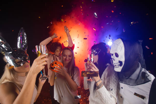 istock People dancing on Halloween party 1347264826