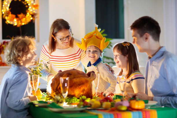 istock Thanksgiving family dinner. Roasted turkey meal. 1347266425