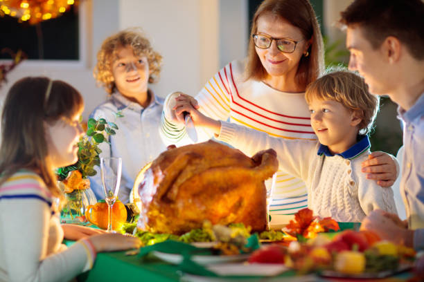 istock Thanksgiving family dinner. Roasted turkey meal. 1347266588