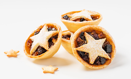 Traditional British Christmas pastry Mince Pies with apple, raisins, nuts filling.