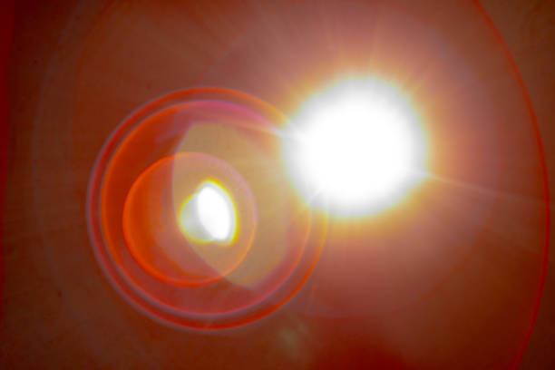 istock Sun flare on the black background 1347269425