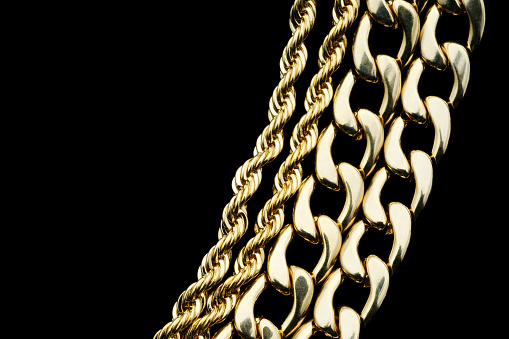 Gold chains on black