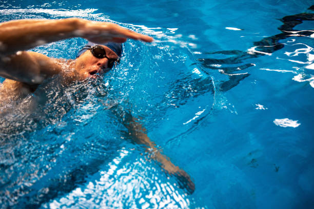 istock Swimmer breathing performing the crawl stroke 1347272636