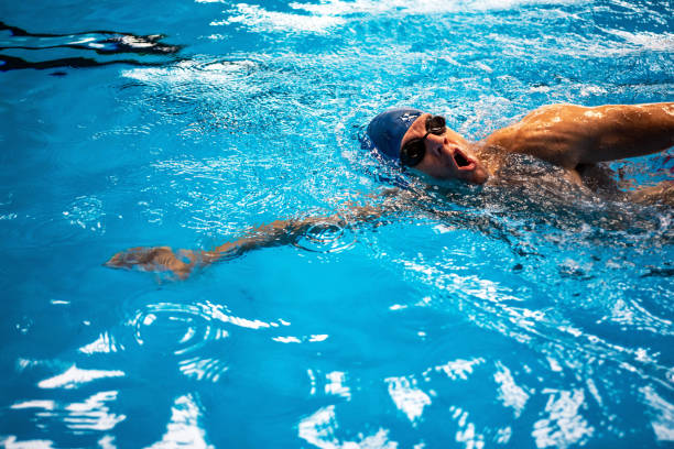 istock Swimmer breathing performing the crawl stroke 1347272639