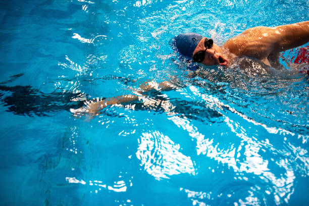 istock Swimmer breathing performing the crawl stroke 1347272755