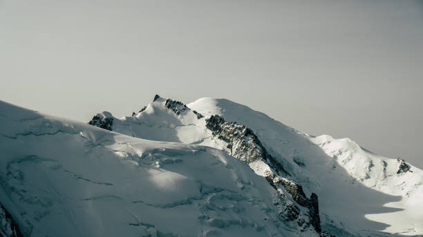 istock Majestic Alps seen from above. Sharp peaks covered with iceberg and snow 1347273110
