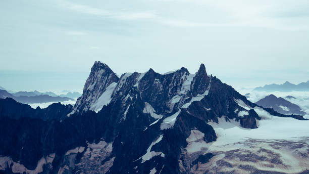 istock Majestic sharp peak. Snowy mountain landscape 1347273728