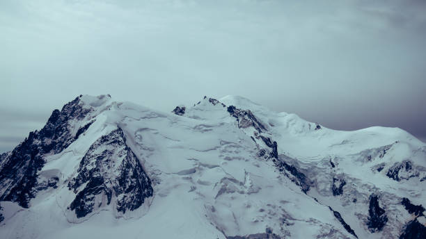 istock Majestic sharp peak. Snowy mountain landscape 1347273794