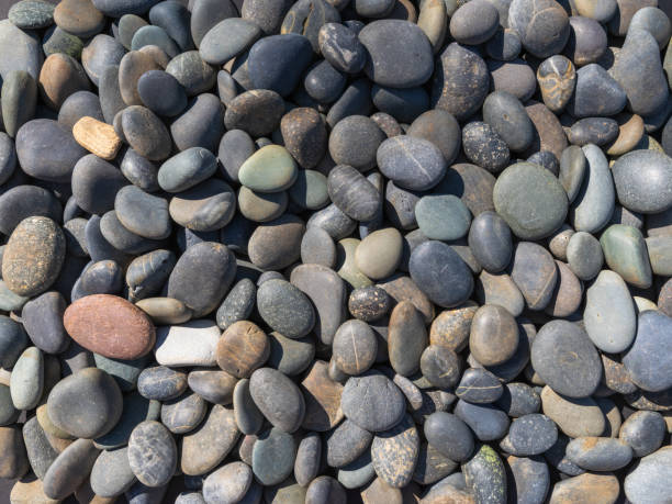 istock Tulane River Stones Smooth Inca Red Left 1347277916