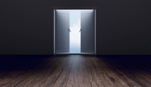 istock dark room with opening door to sky 1347280162