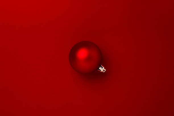 istock Red Christmas ball decoration on red background 1347280230
