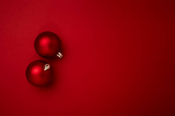 istock Red Christmas ball decoration on red background 1347280337