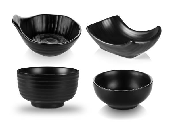 istock Beautiful shape ceramic black bowl isolated on white 1347281353