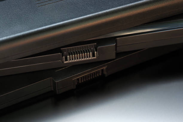 istock Laptop batteries. Pile of Battery Laptop computer. Battery that has deteriorated or broken, reuse and recycle concept. Technology background 1347283717