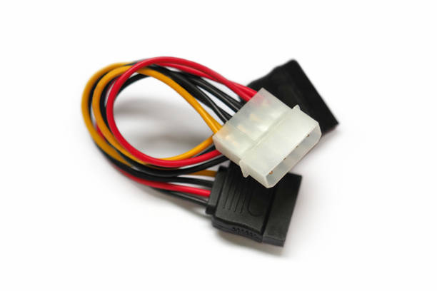 istock SATA power adapter. 4 pin molex socket to 2 sata adapter cable on white background 1347283996