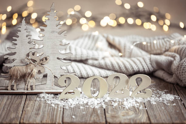 istock Cozy christmas composition with number 2022 and decor details. 1347292542