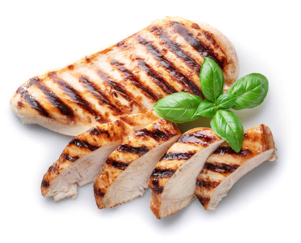 istock Grilled chicken fillet with herbs isolated on white background. 1347292569