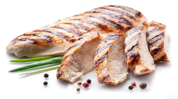 istock Grilled chicken fillet with herbs isolated on white background. 1347292657