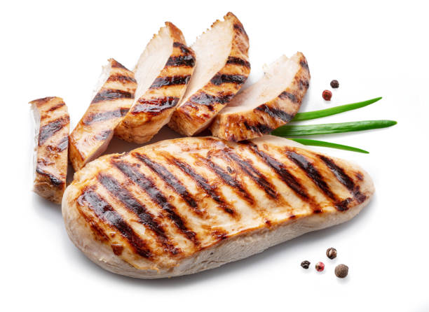 istock Grilled chicken fillet with herbs isolated on white background. 1347292669