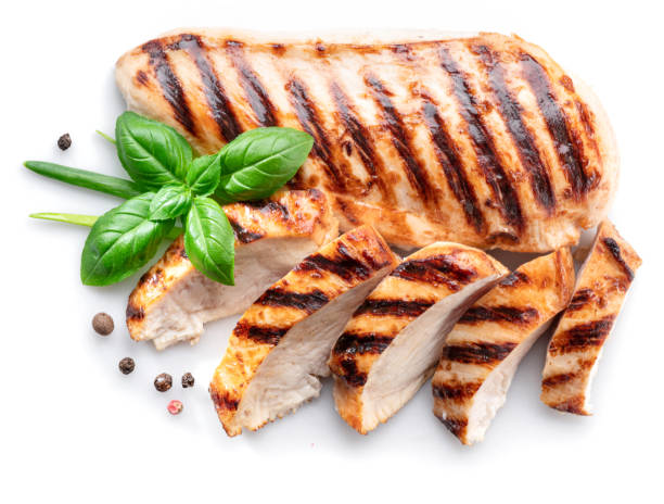 istock Grilled chicken fillet with herbs isolated on white background. 1347292681