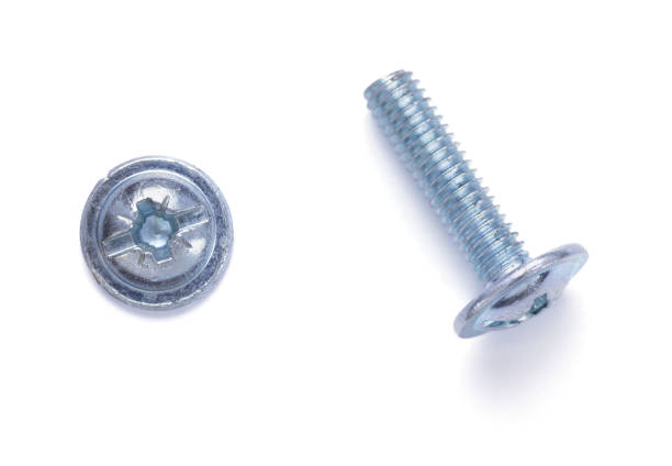 istock Old metal screw head tool isolated at white background 1347293024