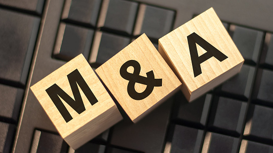 letters m and a made with wood building blocks, business concept. Can be used for business and financial concept.