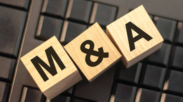 word m and a made with wood building blocks, stock image letters m and a made with wood building blocks, business concept. Can be used for business and financial concept. mergers and acquisitions stock pictures, royalty-free photos & images