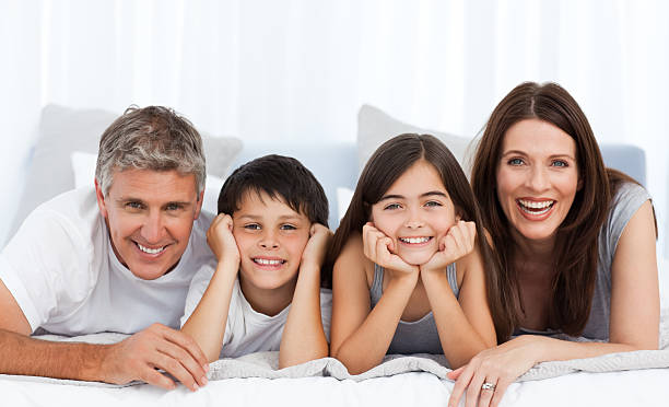 istock Happy familly looking at the camera 134729955