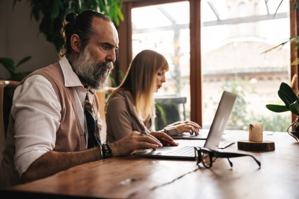 istock Business senior partners at work from their office 1347299900