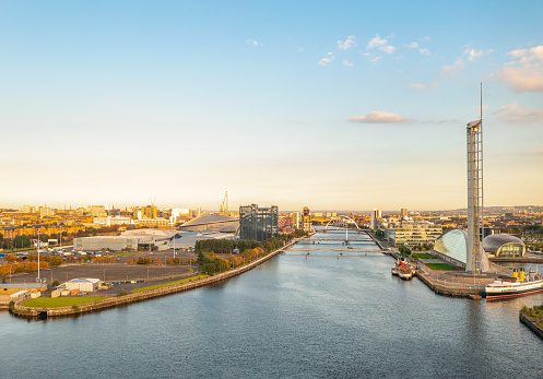 An aerial view over the Scottish city of Glasgow, looking eastwards up the River Clyde.