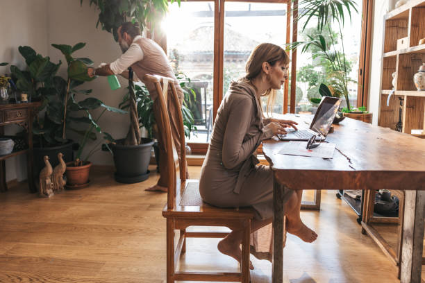 istock Businesswoman at work on laptop in her studio 1347301197