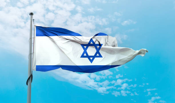 istock Israel flag - realistic waving fabric flag. 1347302755