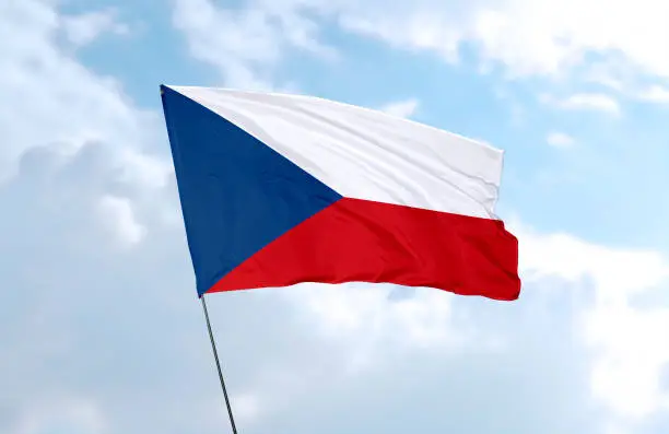 Flag of Czech Republic in front of the blue sky