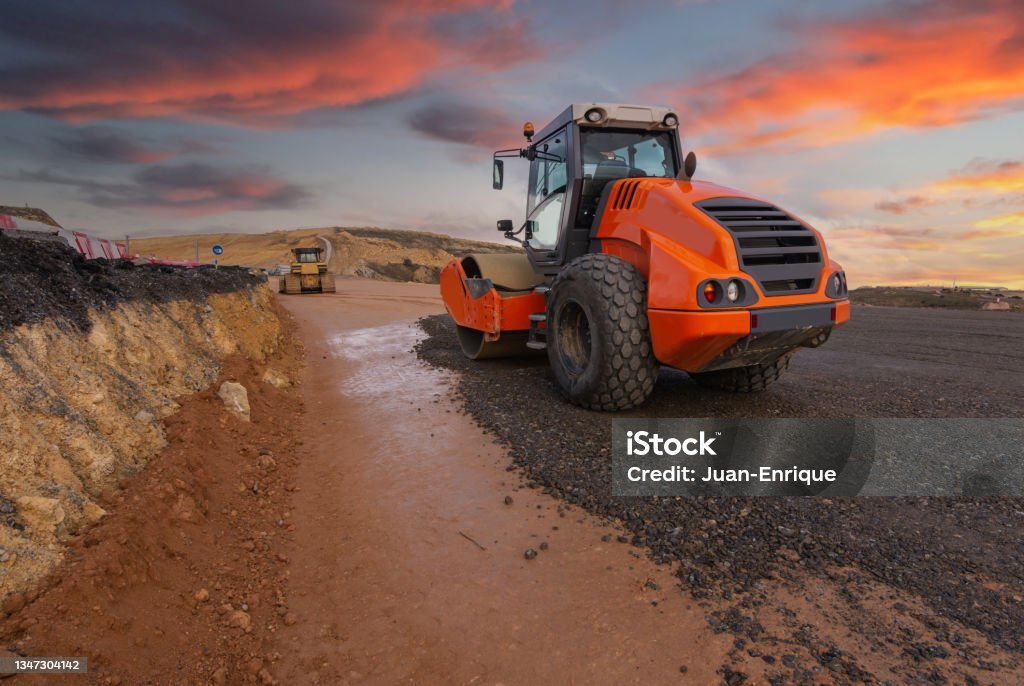 Heavy Steamroller Steamroller Performing Leveling Work On A Road Under Construction Stock ...