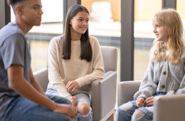 istock Teenagers Talking at a Youth Center 1347307112