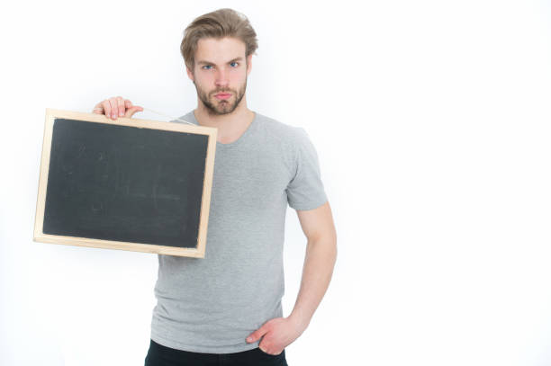 istock empty blackboard in hand of man or businessman 1347314663
